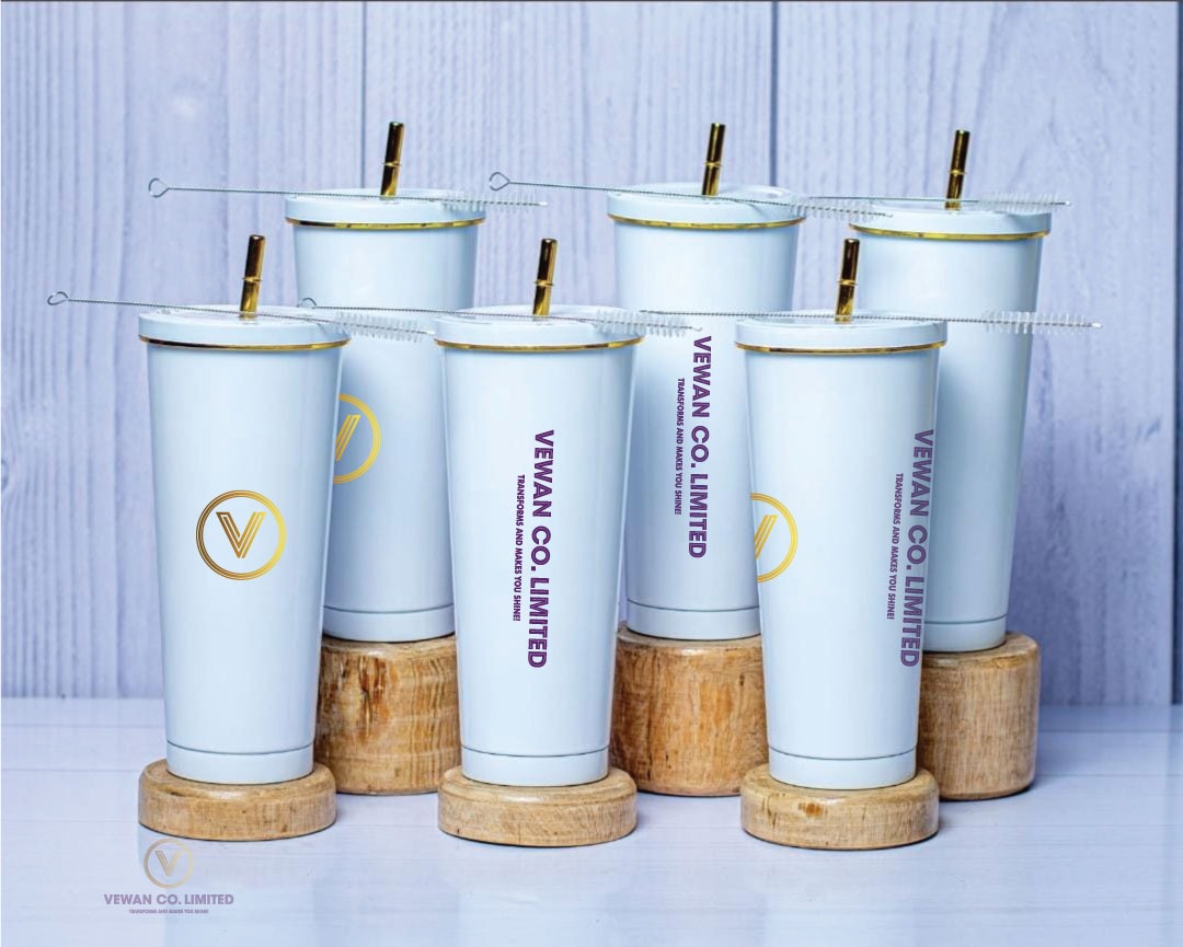 White and gold Vewan-branded tumblers, studio shot
